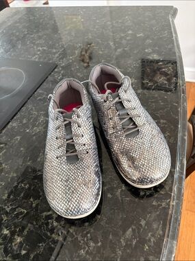 Dressy  sneakers with snake  skin  imitation with shine